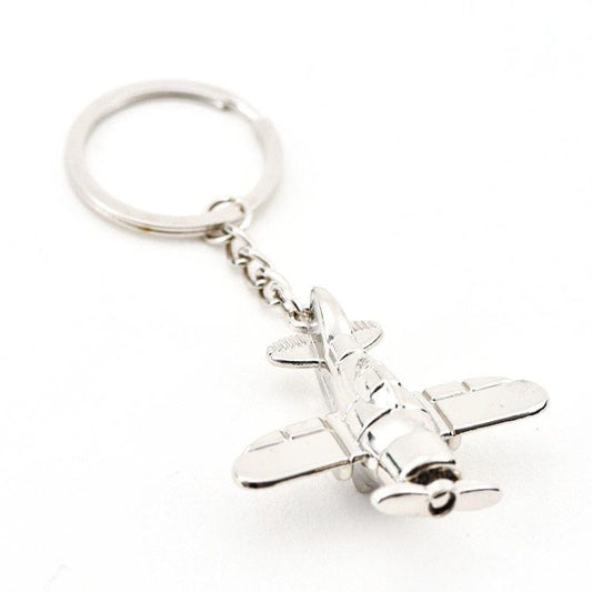 Porte-cles avion en metal argente