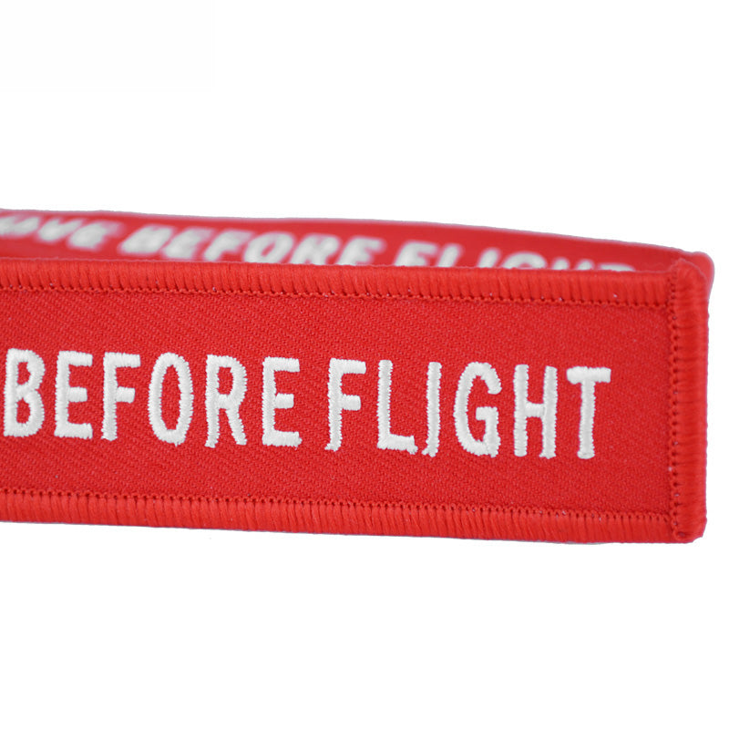 Aéo - Porte Flamme Remove Before Flight Rouge