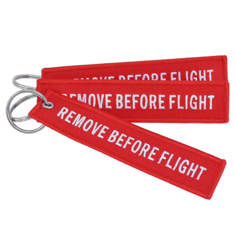 Aéo - Porte Flamme Remove Before Flight Rouge