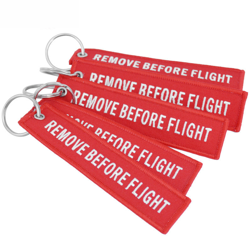 Aéo - Porte Flamme Remove Before Flight Rouge