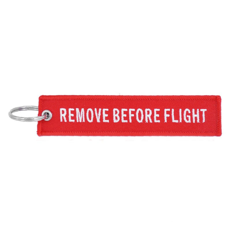 Flamme Remove Before Flight rouge