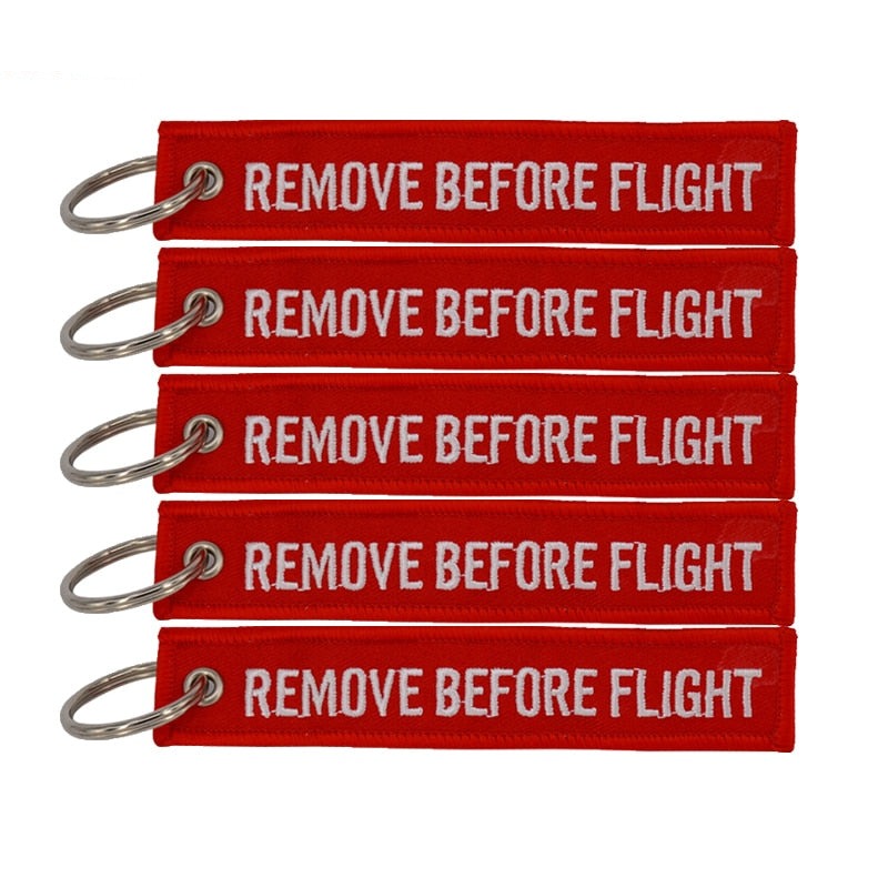 Aéo - Porte Clés Flamme Remove Before Flight (5 pièces)