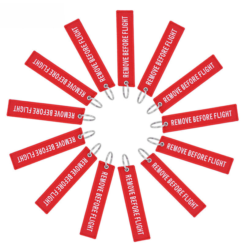 Remove Before Flight rouge brode