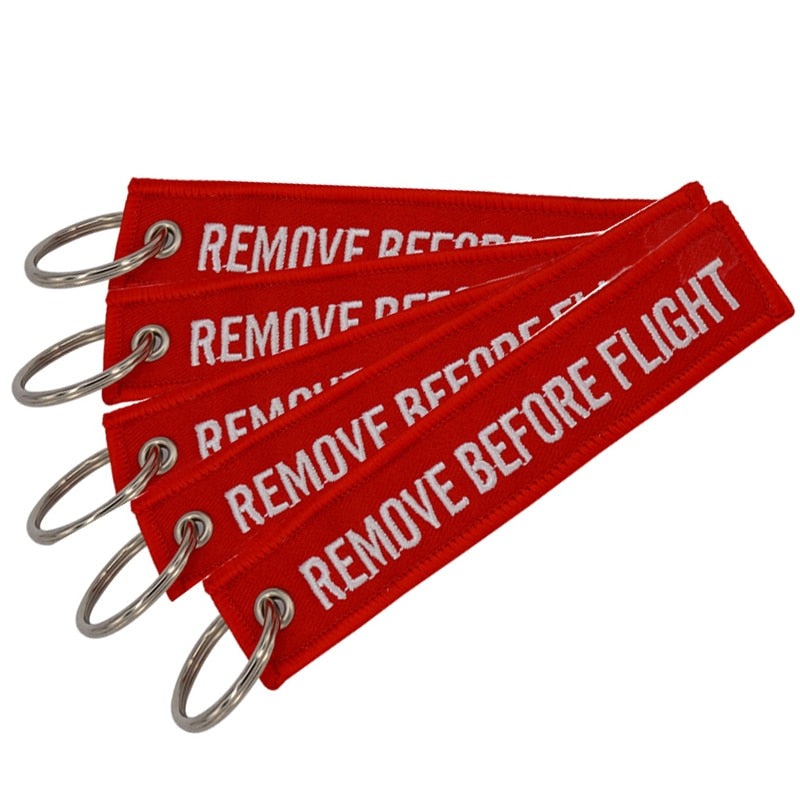 Aéo - Porte Clés Flamme Remove Before Flight (5 pièces)